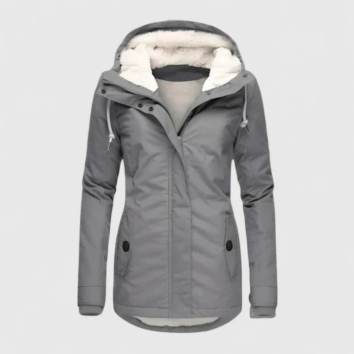 Amélia™ | Le seul manteau d'hiver qui garantit chaleur, étanchéité et élégance.
